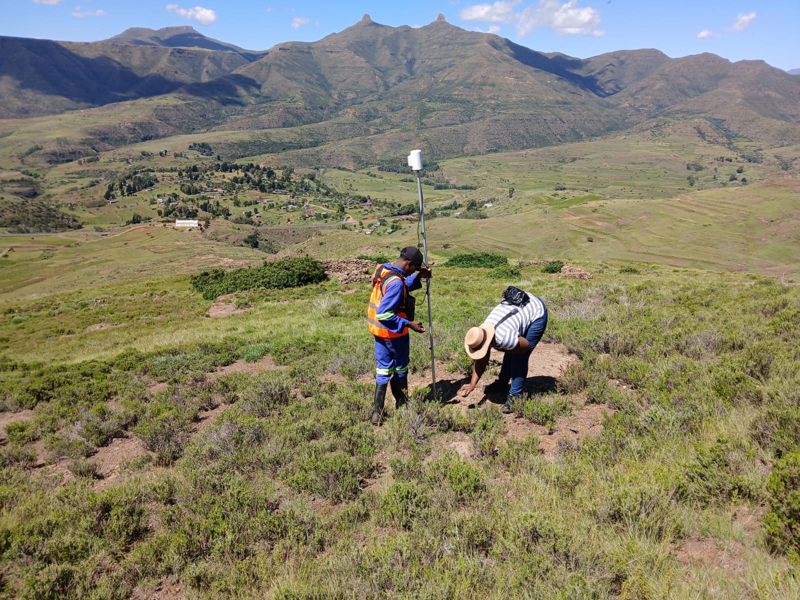 Terrain survey work on a hillside